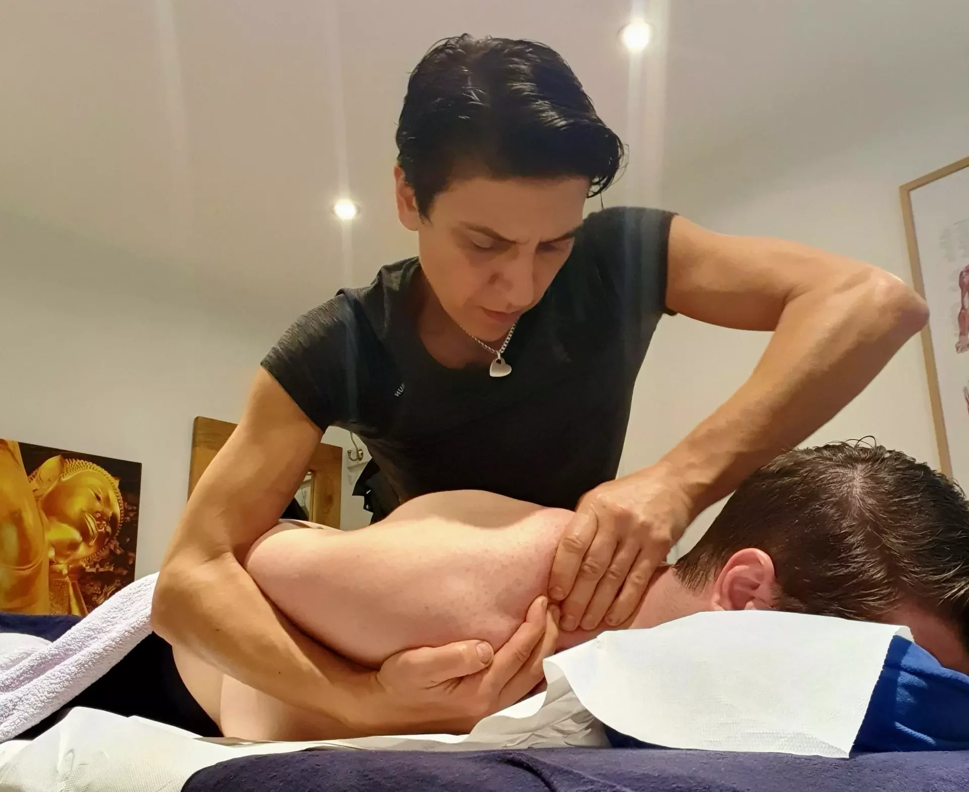 Therapist providing therapeutic back and shoulder massage treatment at Life Massage clinic in East Dulwich
